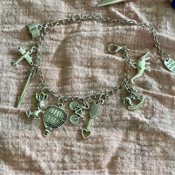 2/$9 Silver Charm Bracelet with Unique Pendants - Picture 3 of 6